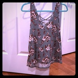 A greenish floral tank top